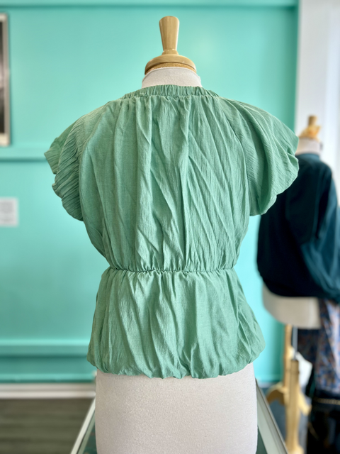 La February  Size L Tops